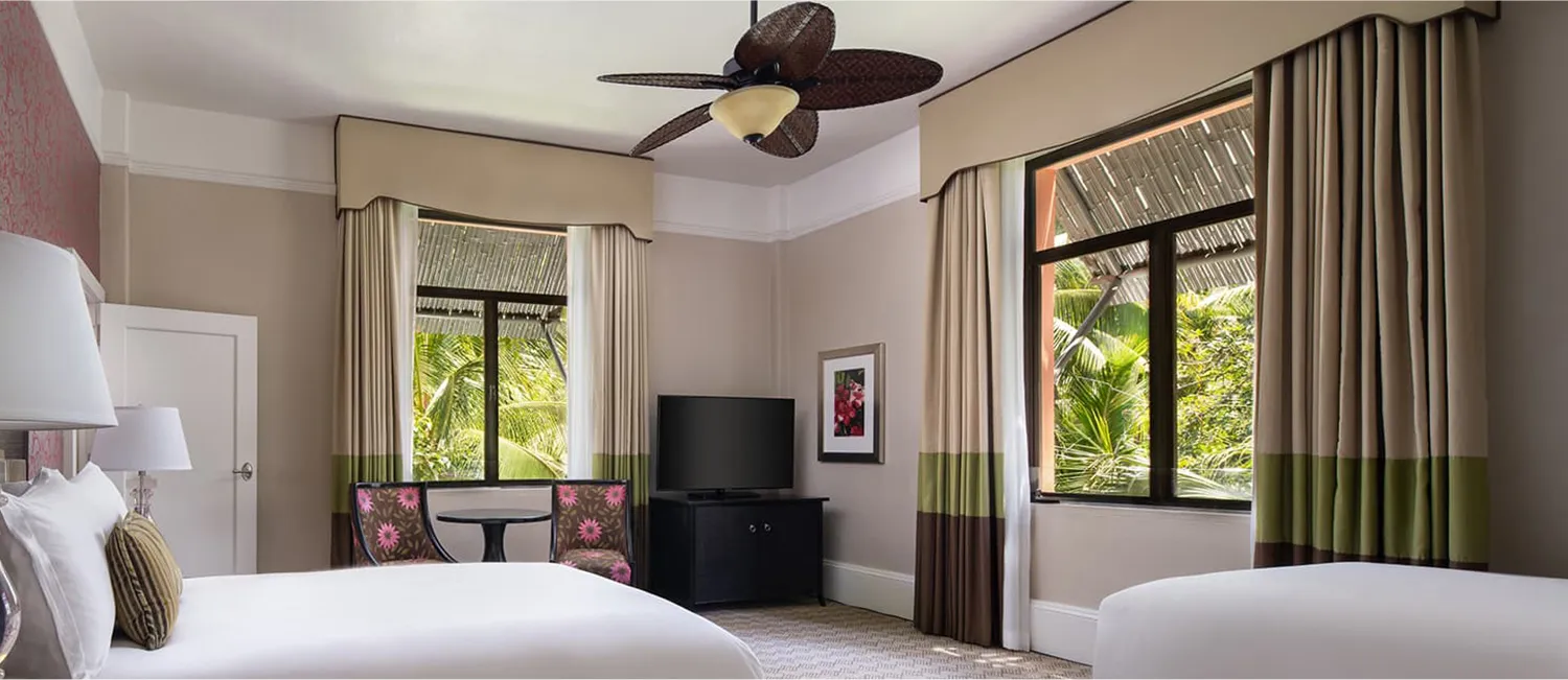 Historic 3 Bed Family Room featuring three beds in a spacious setting for families.