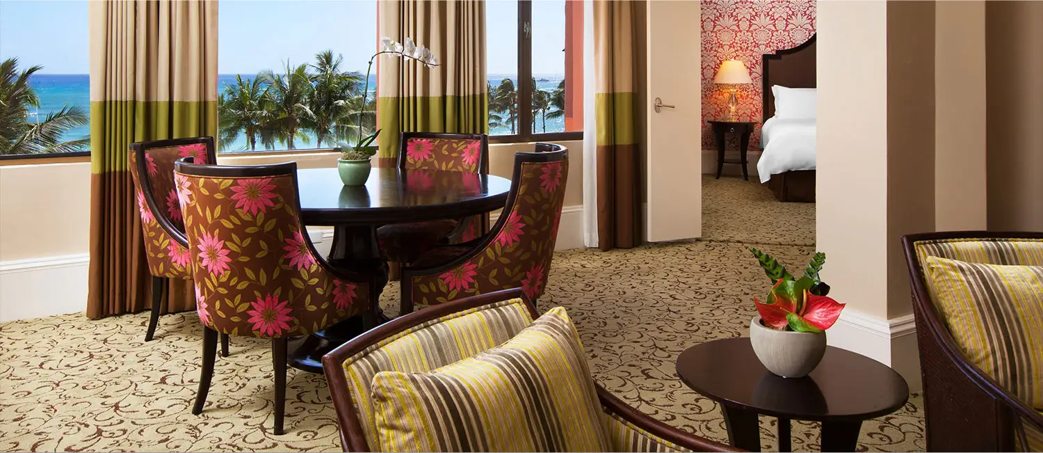 Bright and classic dining area with an ocean view.