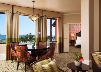 The living and bedroom areas of an ocean-view suite at The Royal Hawaiian.